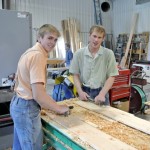 Chris and Jamie hand scraping Douglas fir floors