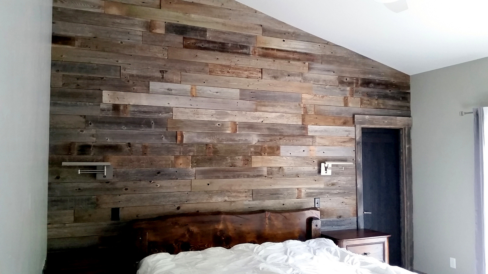 Reclaimed wind fence wall Sustainable Lumber Company