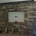 reclaimed grey wood wall